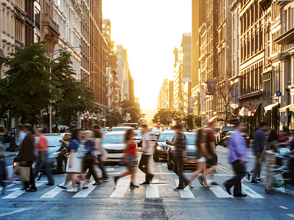 people crossing the street in new york city
